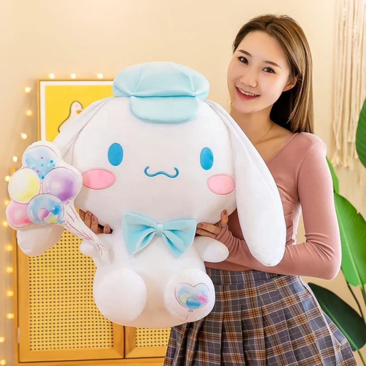 Gấu bông cinnamoroll cầm bóng. thú nhồi bông cinnamoroll