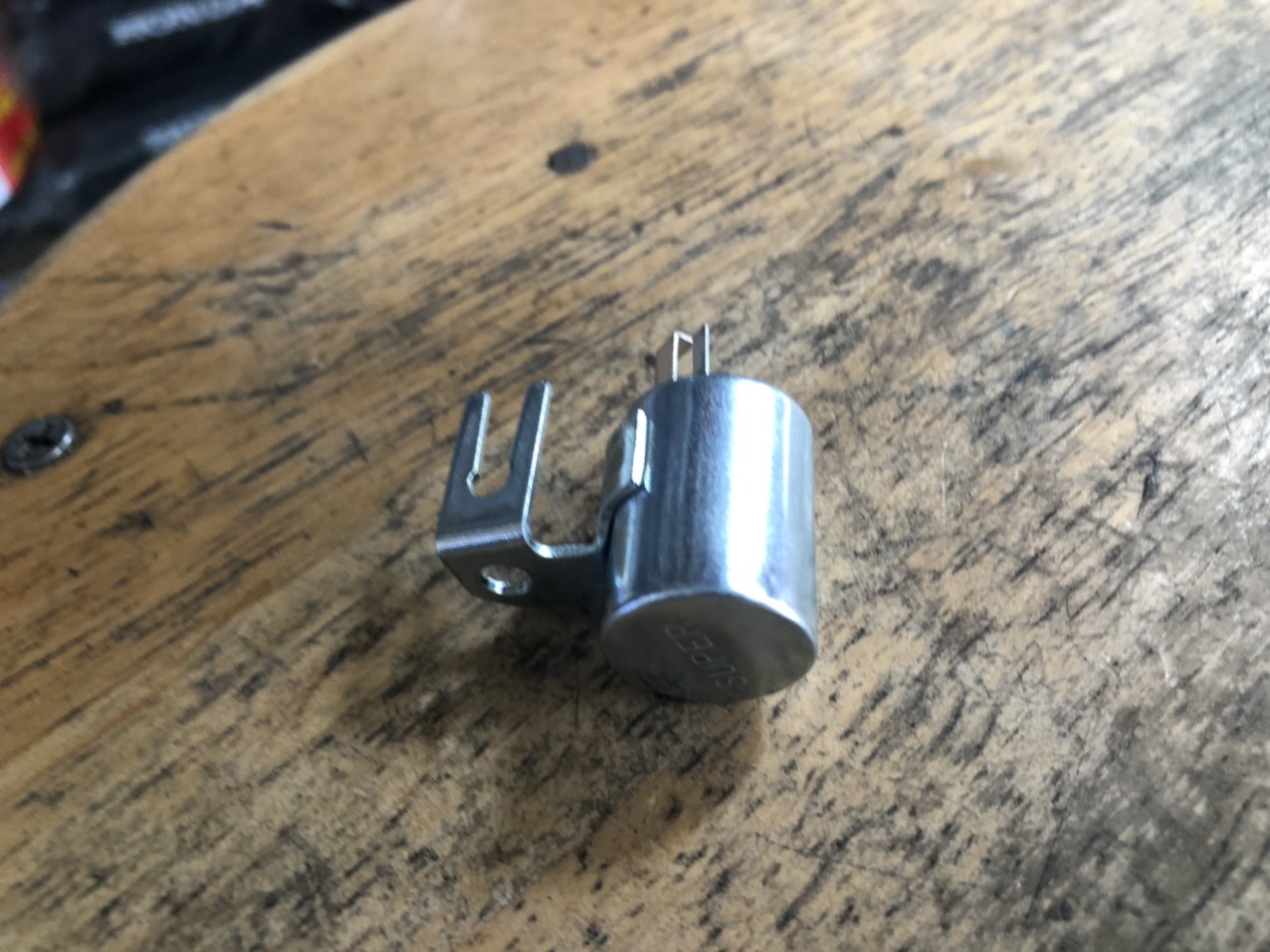 bộ điện vít lửa xe honda 67- cub : con Chuột (tụ hay transitor) zin cho bộ volang mâm điện má vít xe