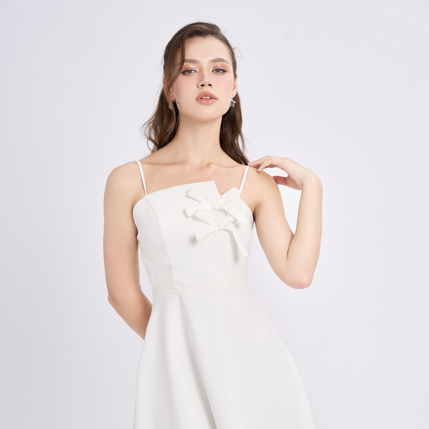 Đầm mini xòe bố len phối nơ trang trí lệch Maybi