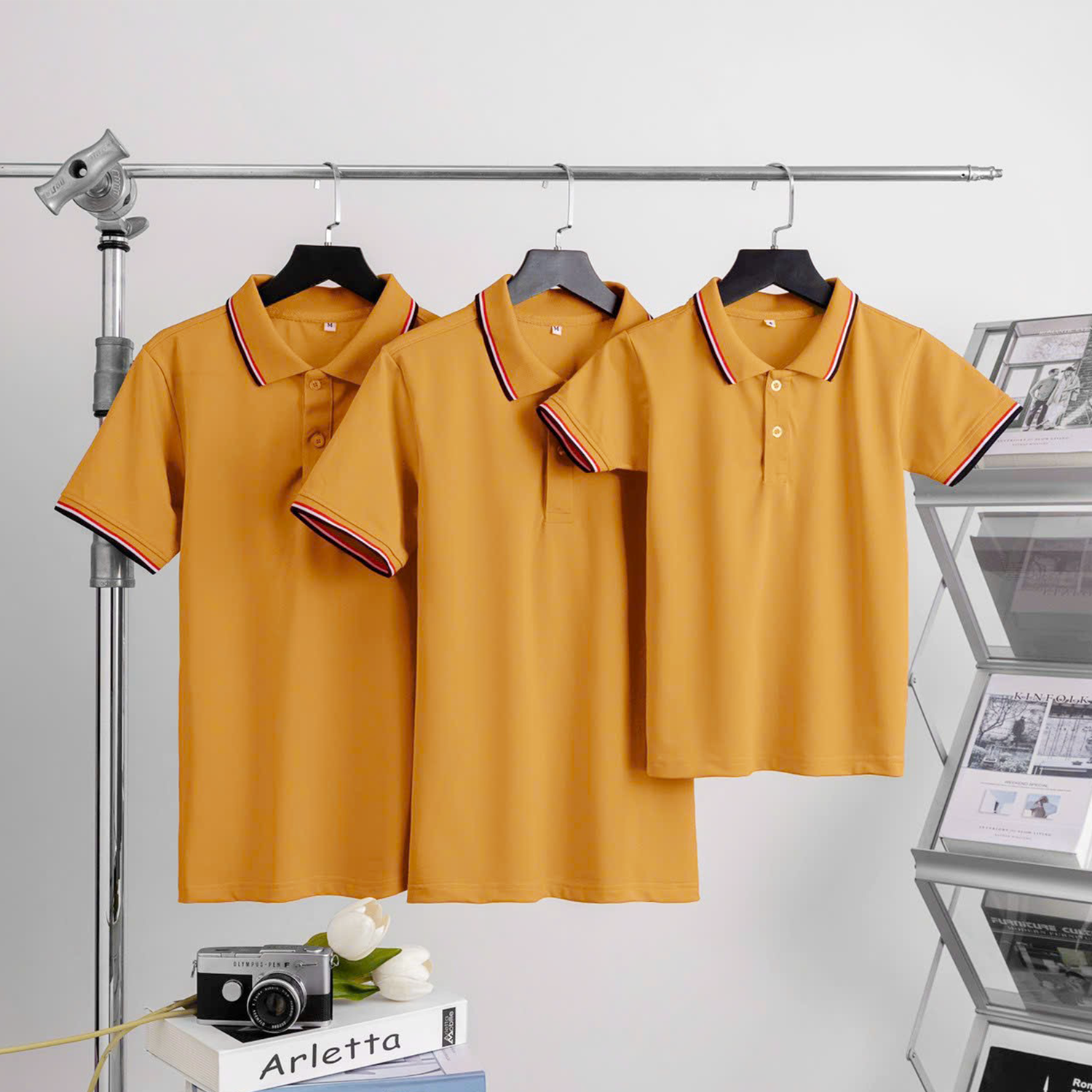 Áo thun Polo đồng phục Nam Nữ màu vàng bò phối viền tay và cổ sọc đỏ đen trắng