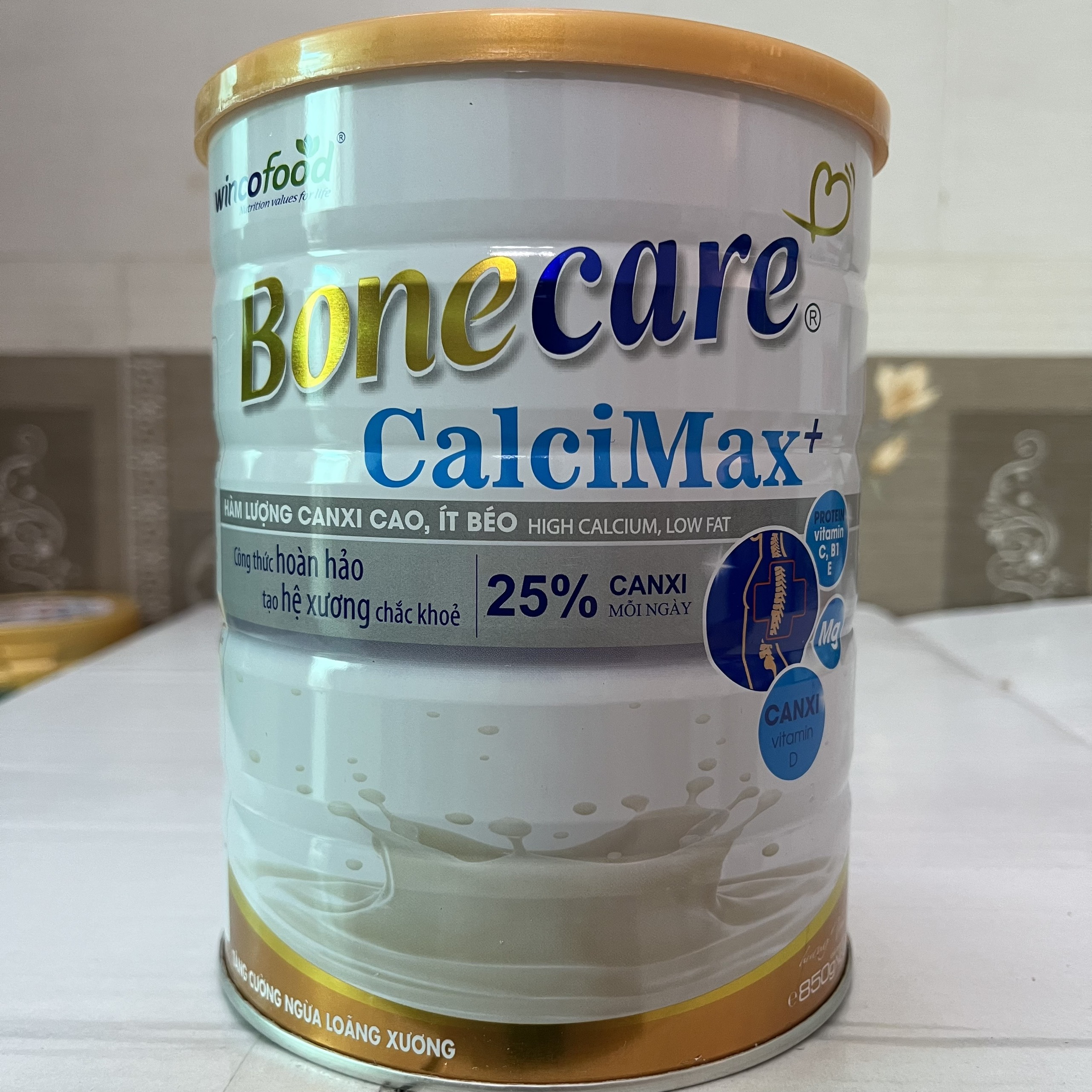 Sữa bột Wincofood Bonecare CalciMax+ hương vani lon 850g ít béo hàm lượng canxi cao ngừa loãng xương