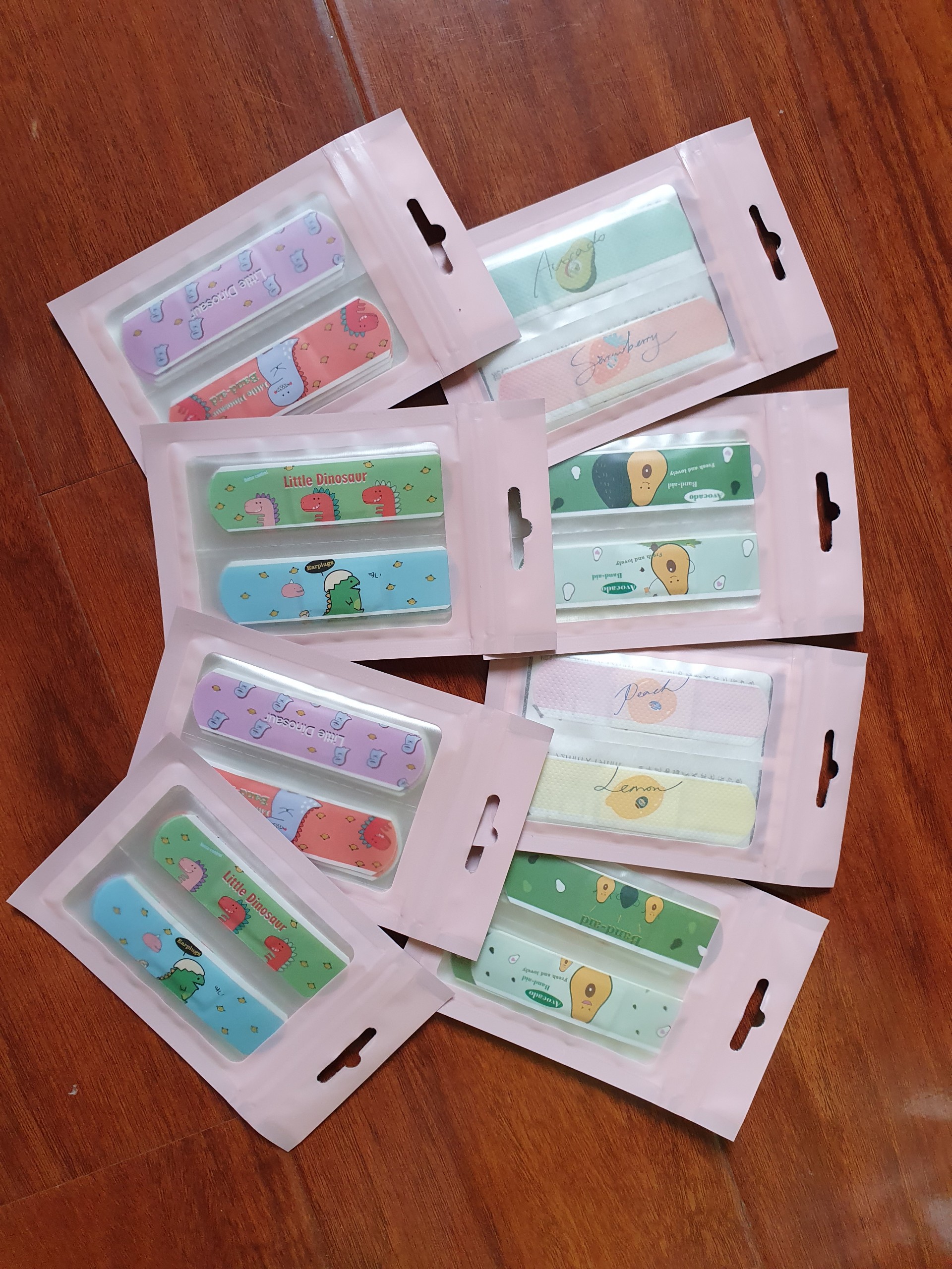 [HCM]Combo 10 miếng băng keo cá nhân hình khủng long trái cây hoa đào chống thấm nước 10 băng dán urgo bảo vệ vết thương hiệu quả có kèm túi zip xinh xắn