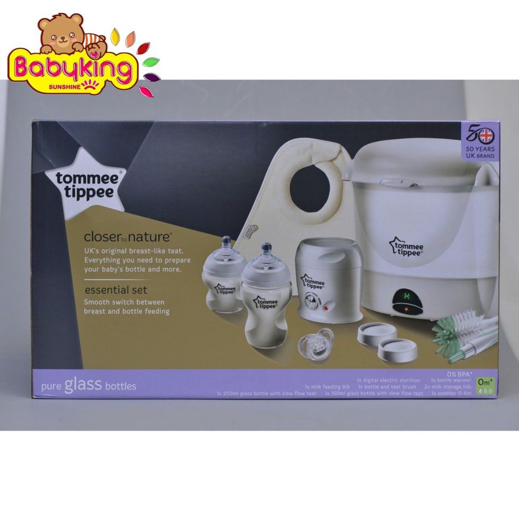 Bộ máy tiệt trùng bình sữa và máy hâm sữa tommee tippee (82023) kèm bình sữa thủy tinh.