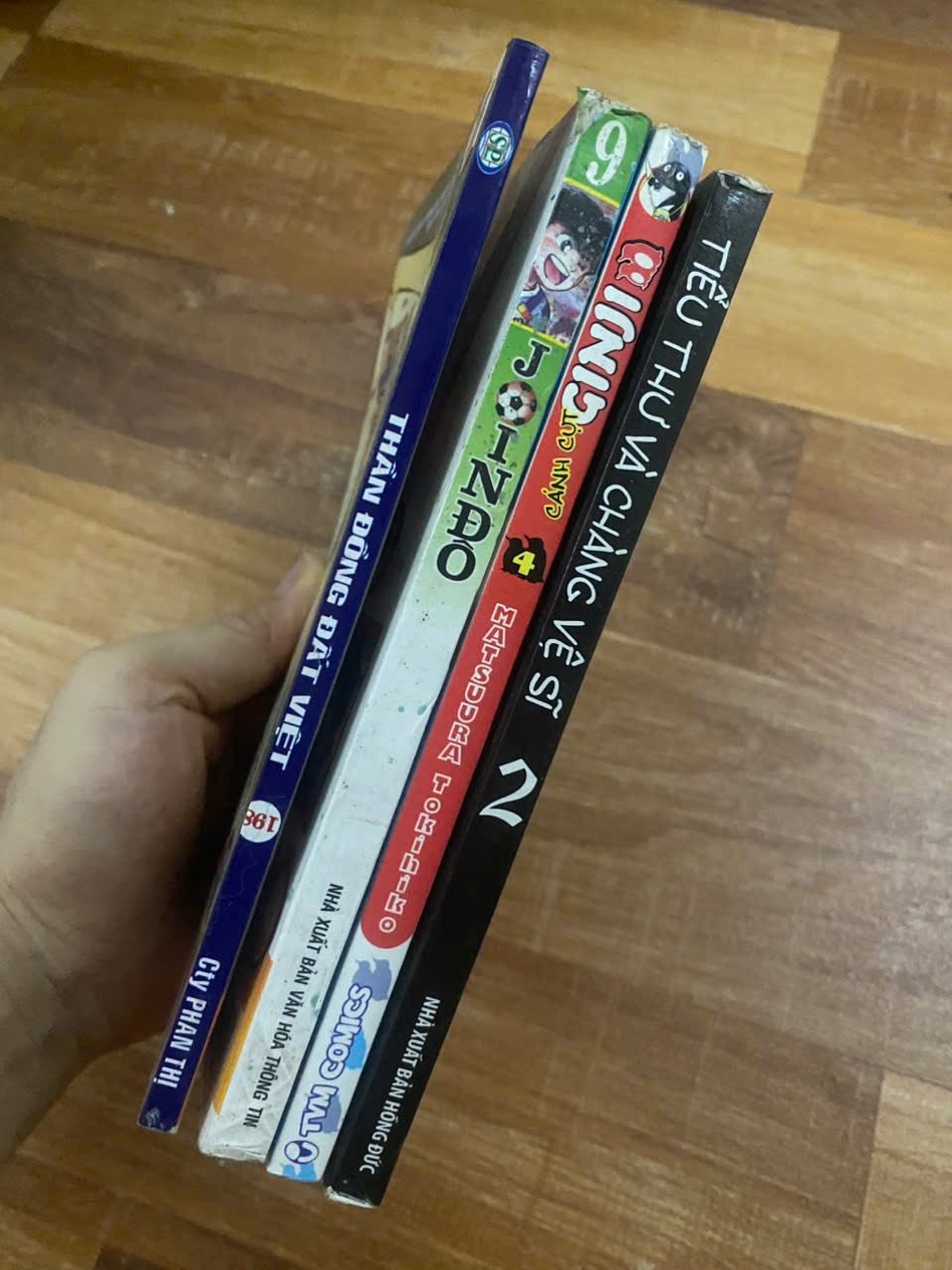 Combo 4q truyện tranh cũ Thần đồng đất việt + cánh cụt Ginji + Jindo + Tiều thư và chàng vệ sĩ