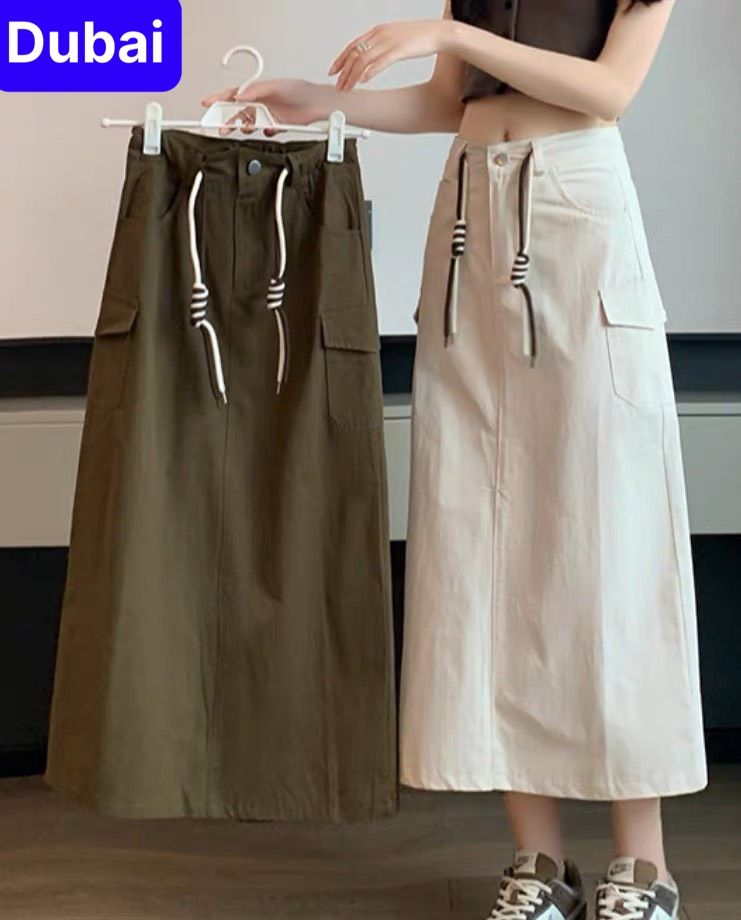 CHÂN VÁY JEAN KAKI CHẤT BÒ DÁNG DÀI CÁ TÍNH CẠP CAP DÂY TO HOT TREND - DUBAI FASHION